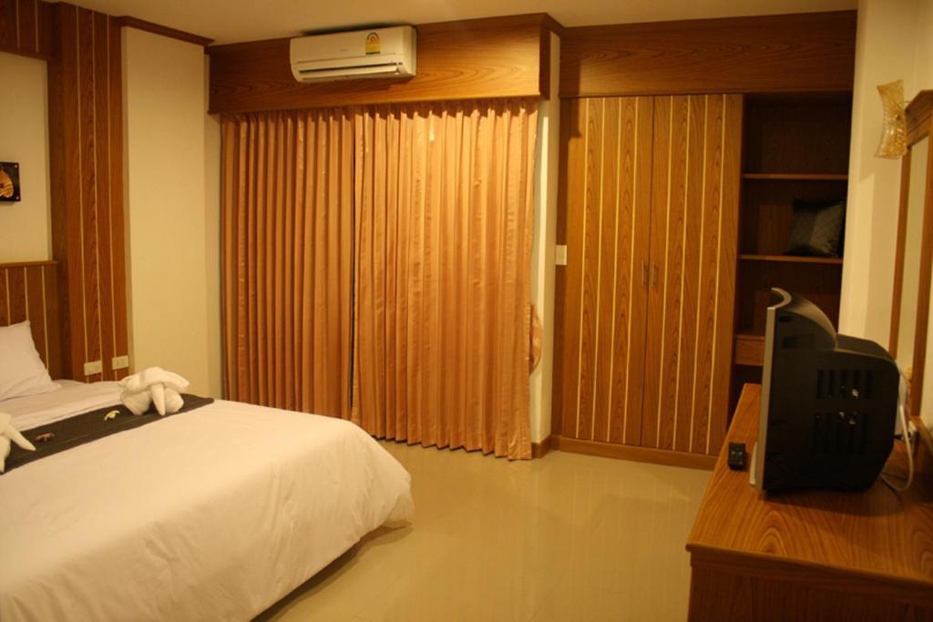 Santi White Hotel Phuket Værelse billede
